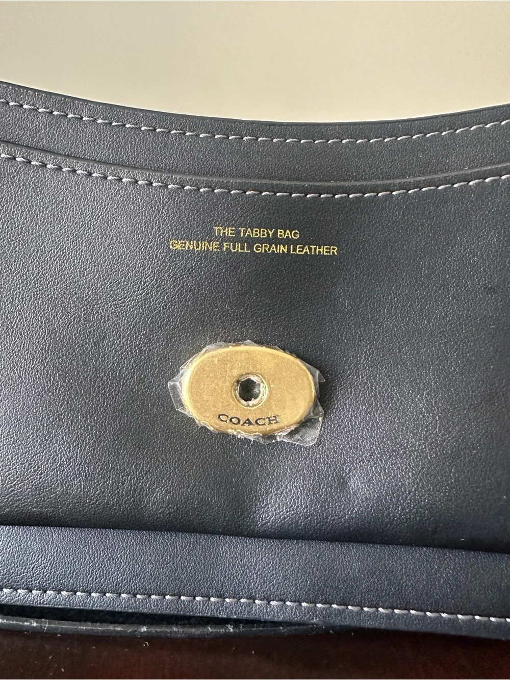 Coach Black Leather Shoulder Bag with Gold 'C' Accent